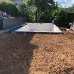 Création d&#8217;une piscine à Ottrott Terrassement , mur de soutènement, pose de palissades ardoises Saverne 1