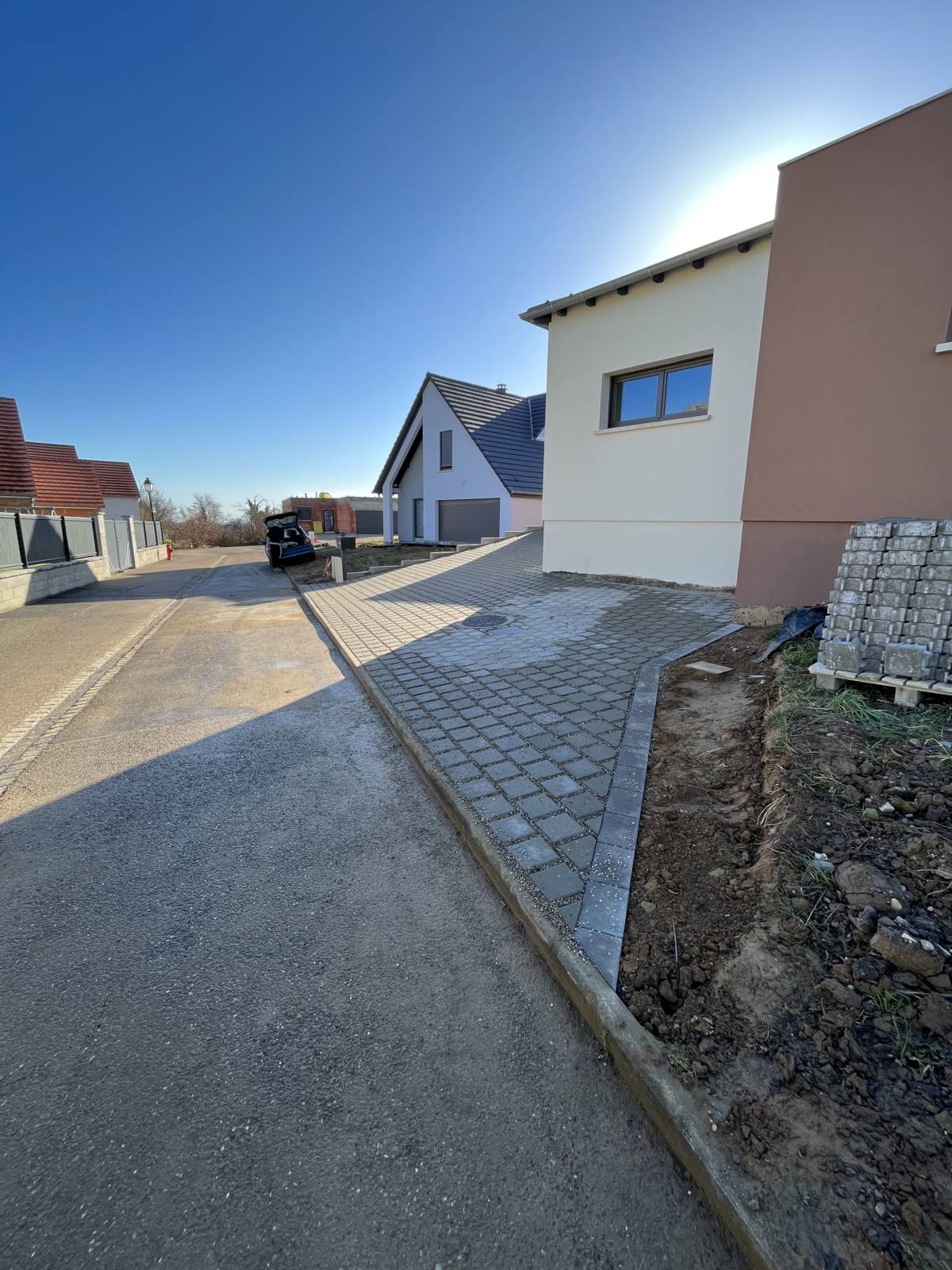 Wintzheim terrassement, pose de mur L , pose de bordure et pose de pavé drainant Hœœnheim