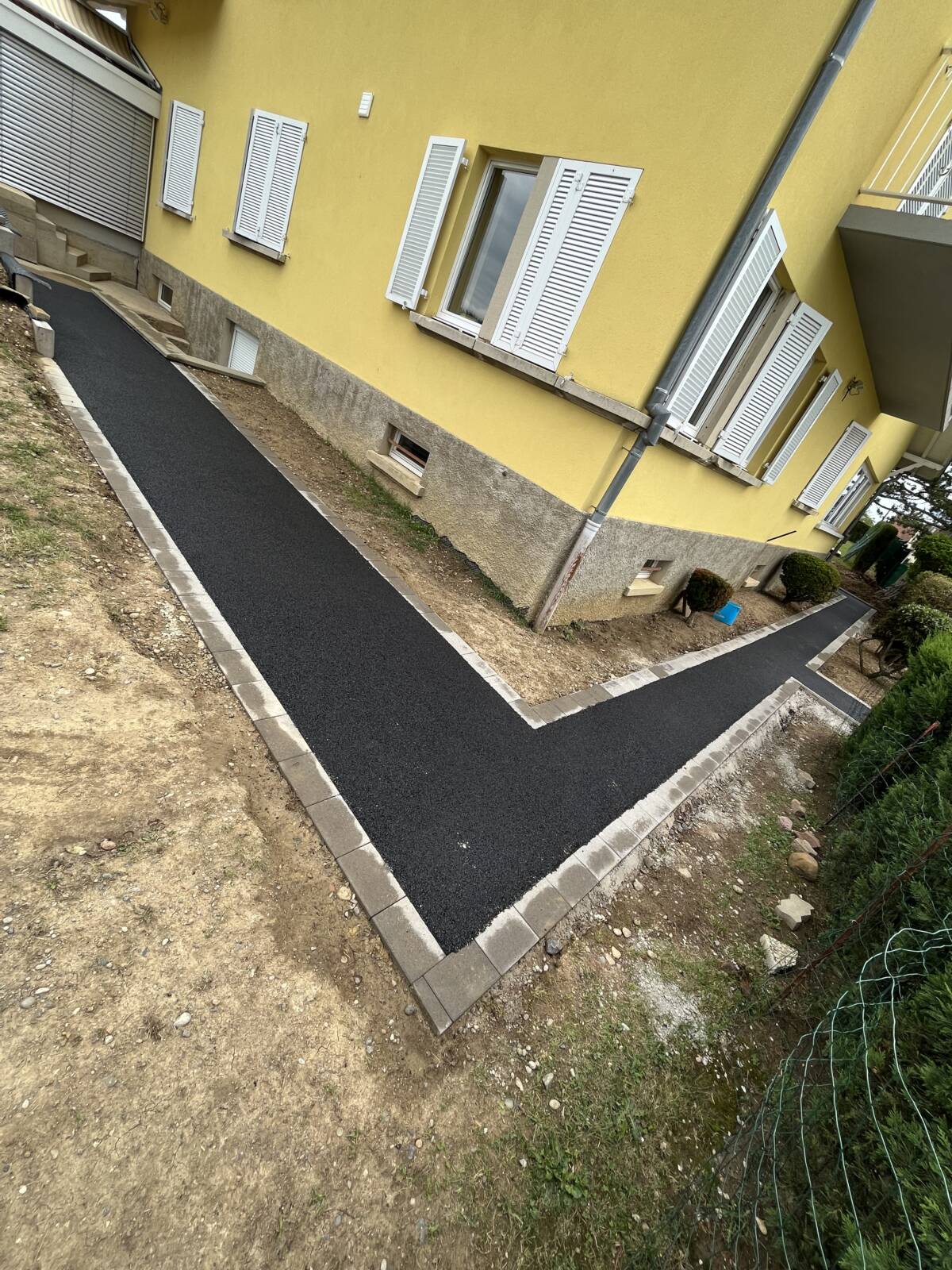 Chantier bernardswiller Terrassement / bordure / fil pavés / mur L / assainissement / enrobé / macadam Brumath